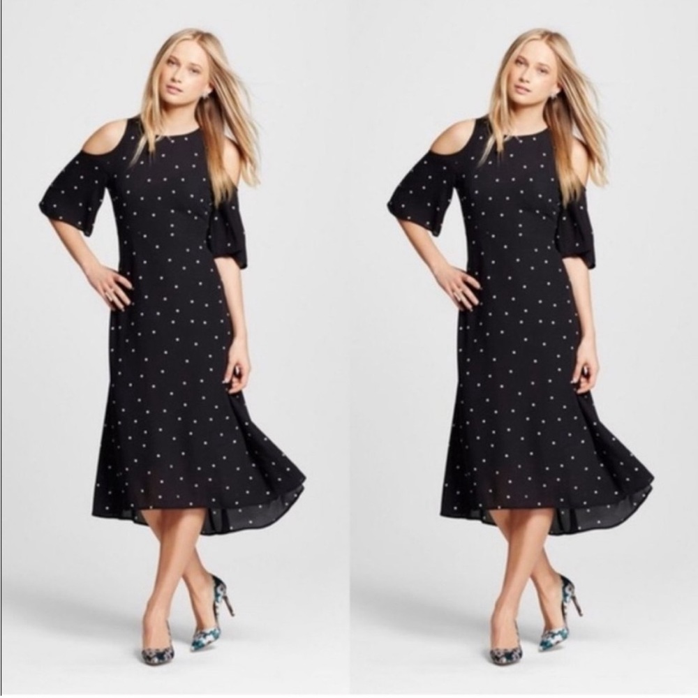 Black with white polkadots. Classy, beautifully fitted dress.
